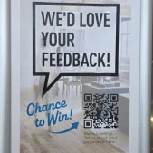 A poster asking for feedback in exchange for a chance to win.